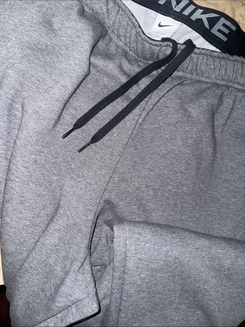 Nike Men's Grey Pullover Jogger Sweatpants with Black Drawstring